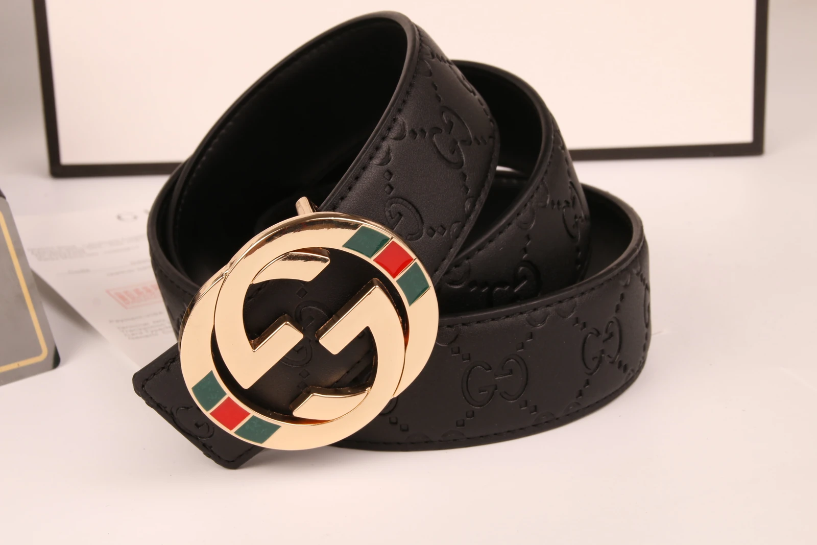 Cinturón Gucci con hebilla GG redonda a rayas · CKS