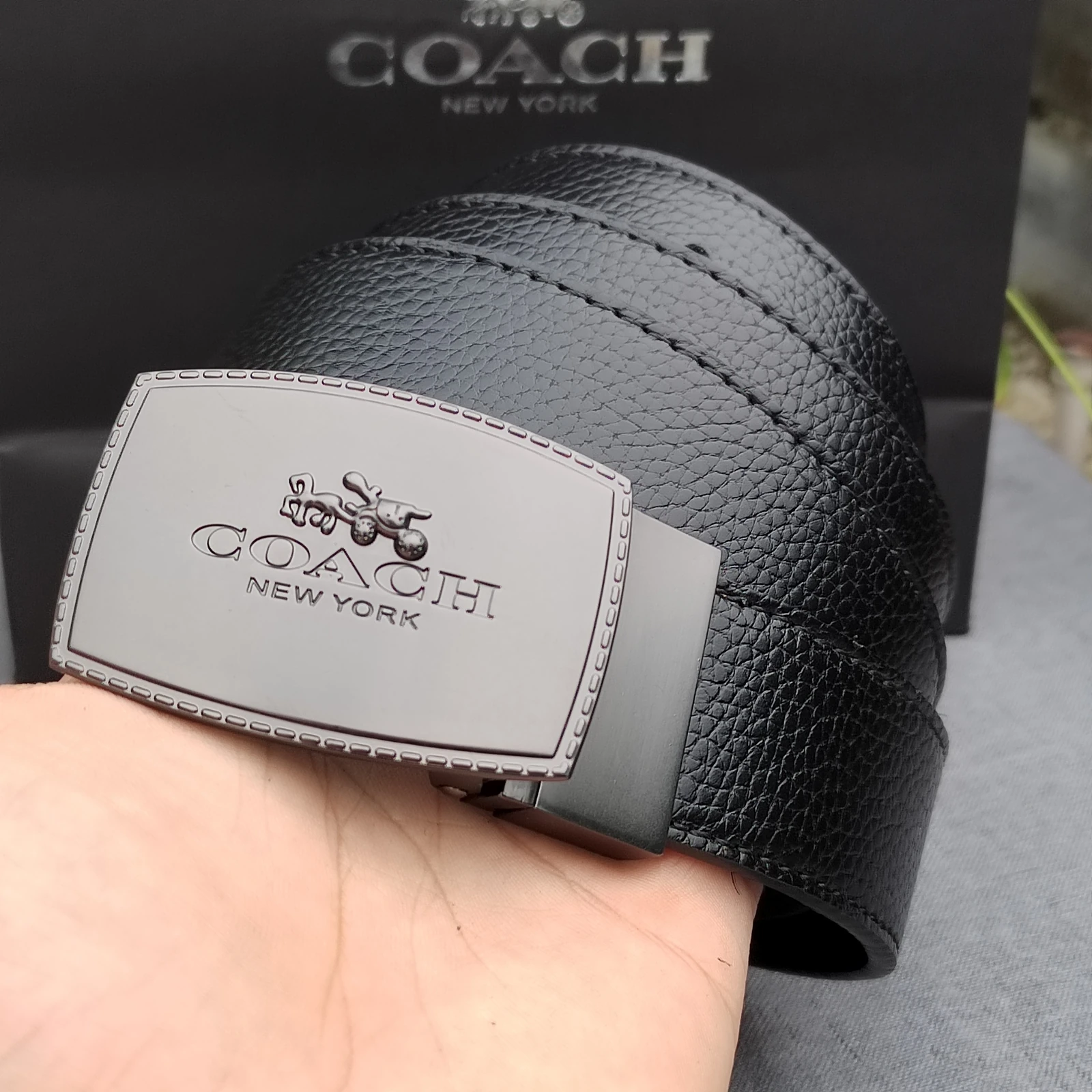 Coach bordered carriage-logo plaque belt · CKS