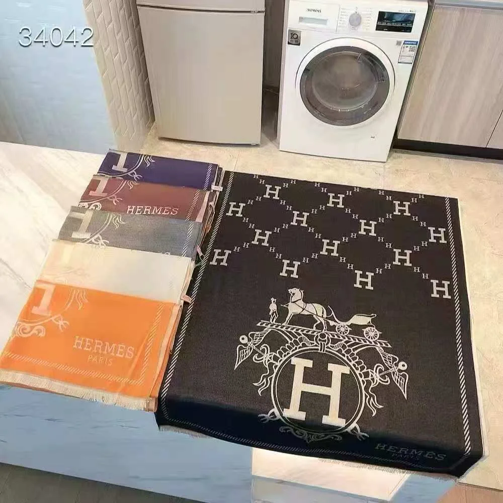 Hermès H and equestrian patterned scarf · QW8